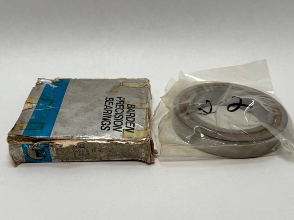 Barden 117HDL angular contact ball bearing pair in plastic sleeve beside original Barden Precision Bearings box