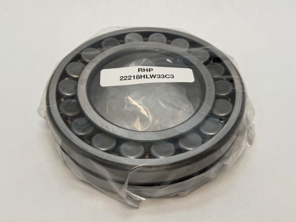 RHP 22218HLW33C3 spherical roller bearing, shrink-wrapped, showing label and roller cage