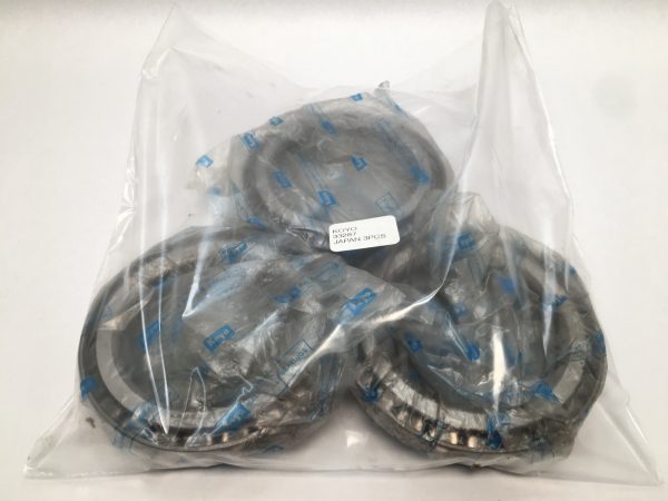 Three Koyo 33287 taper roller bearing cones in a sealed plastic bag with label