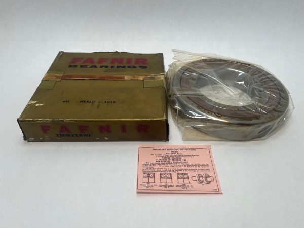 Fafnir 2MM218WI angular contact ball bearing in plastic wrap next to its original box and mounting instructions card