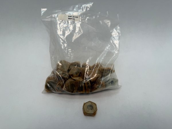 Bagged SKF 51100 single direction thrust ball bearings with one bearing shown separately in front