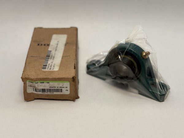 Cast iron two-bolt pillow block bearing, shrink-wrapped, beside its original Dodge cardboard box