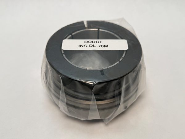 Dodge INS-DL-70M ball bearing insert with D-Lok clamp collar, shrink-wrapped with label