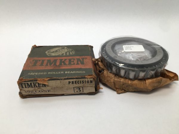 Timken 390A-3 tapered roller bearing cone, shrink-wrapped, beside its original worn Timken box