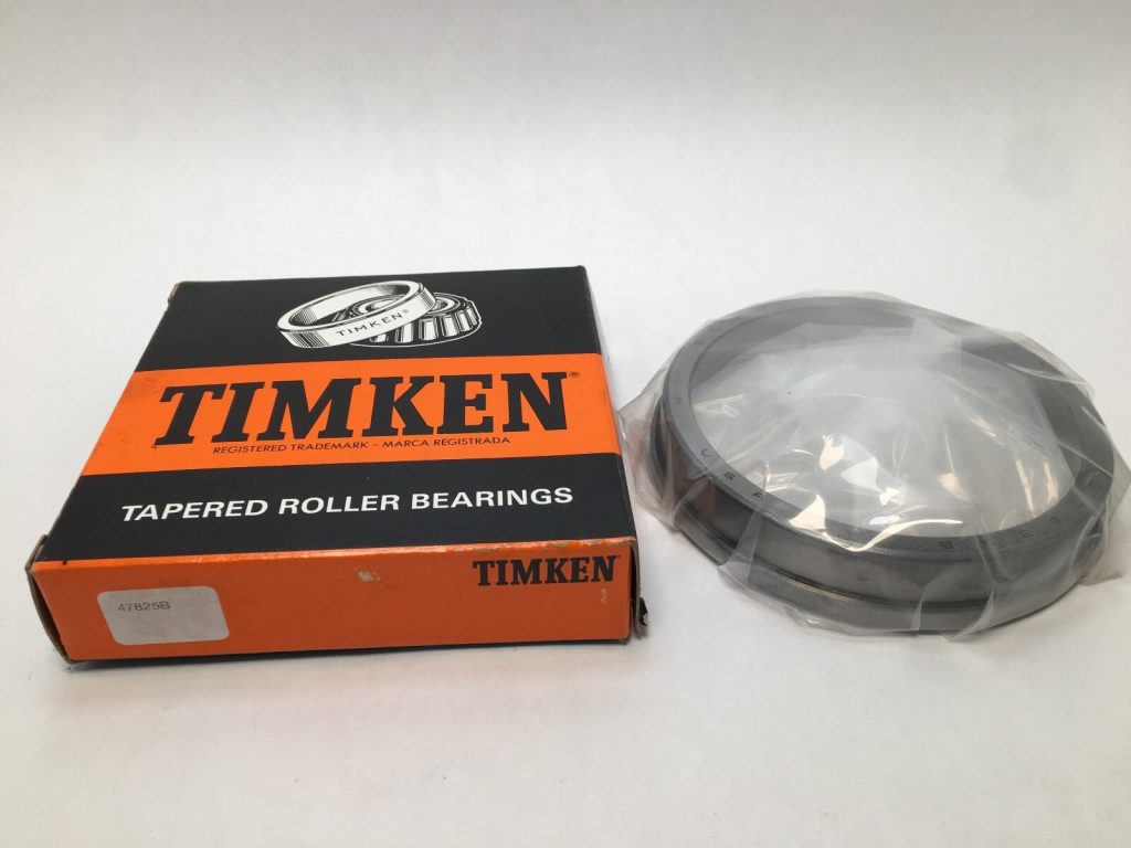 Bower 47825B flanged tapered roller bearing cup in plastic wrap next to its Timken box