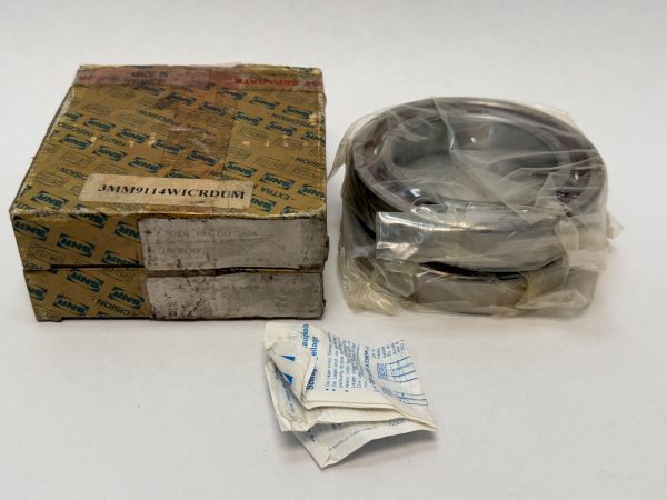 SNR 7014HVDUJ84 angular contact ball bearing pair, shrink-wrapped, beside original SNR box