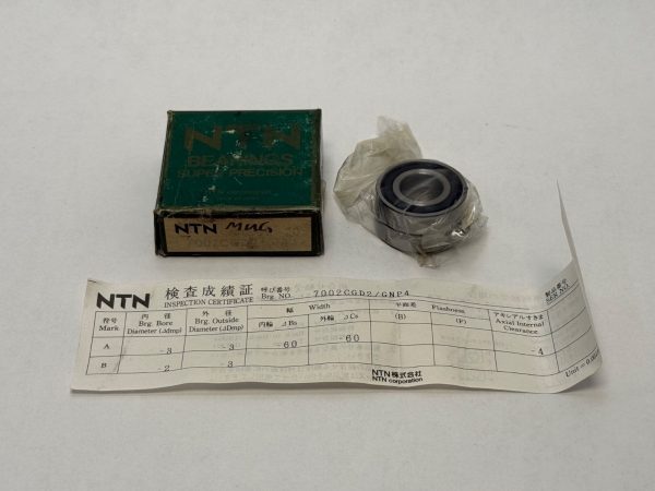 NTN 7002CGD2/GNP4 angular contact ball bearing, partly unwrapped, with original box and inspection certificate