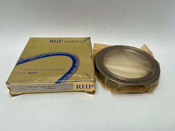 RHP super-precision angular contact ball bearing in plastic wrap next to its gold RHP bearings box