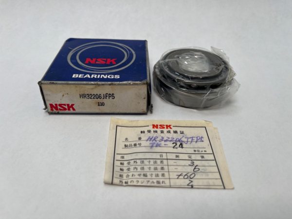 NSK HR32206JFP5 tapered roller bearing cone and cup set, shown in plastic wrap next to its box and inspection slip