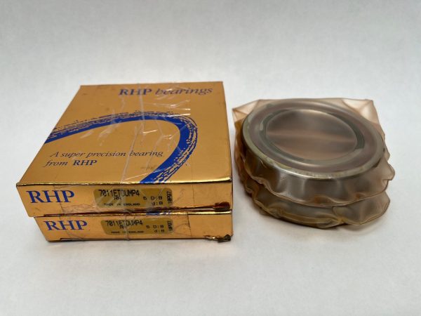 RHP super-precision angular contact ball bearing pair, shrink-wrapped, beside two gold RHP boxes