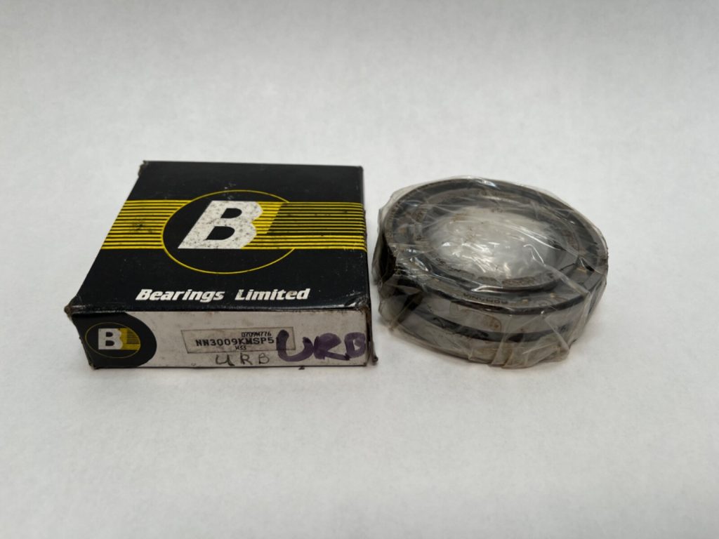 URB NN3009KMSP51 double row cylindrical roller bearing, shrink-wrapped, beside its Bearings Limited box