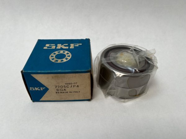 SKF 7205CP4DGA angular contact ball bearing, shrink-wrapped, beside its blue SKF box