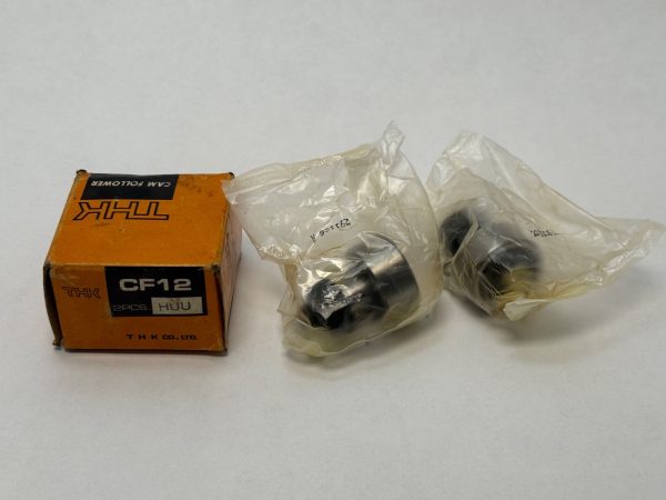 THK CF12 cam follower box with two individually bagged cam followers beside it