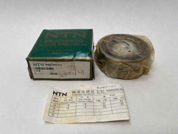 NTN 7009CGD2/GLP4 bearing wrapped in plastic beside its box and inspection certificate