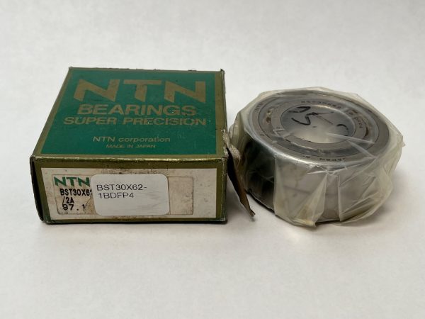 NTN BST30X62-1BDFP4 ball screw support bearing pair, shrink-wrapped, beside its green NTN box
