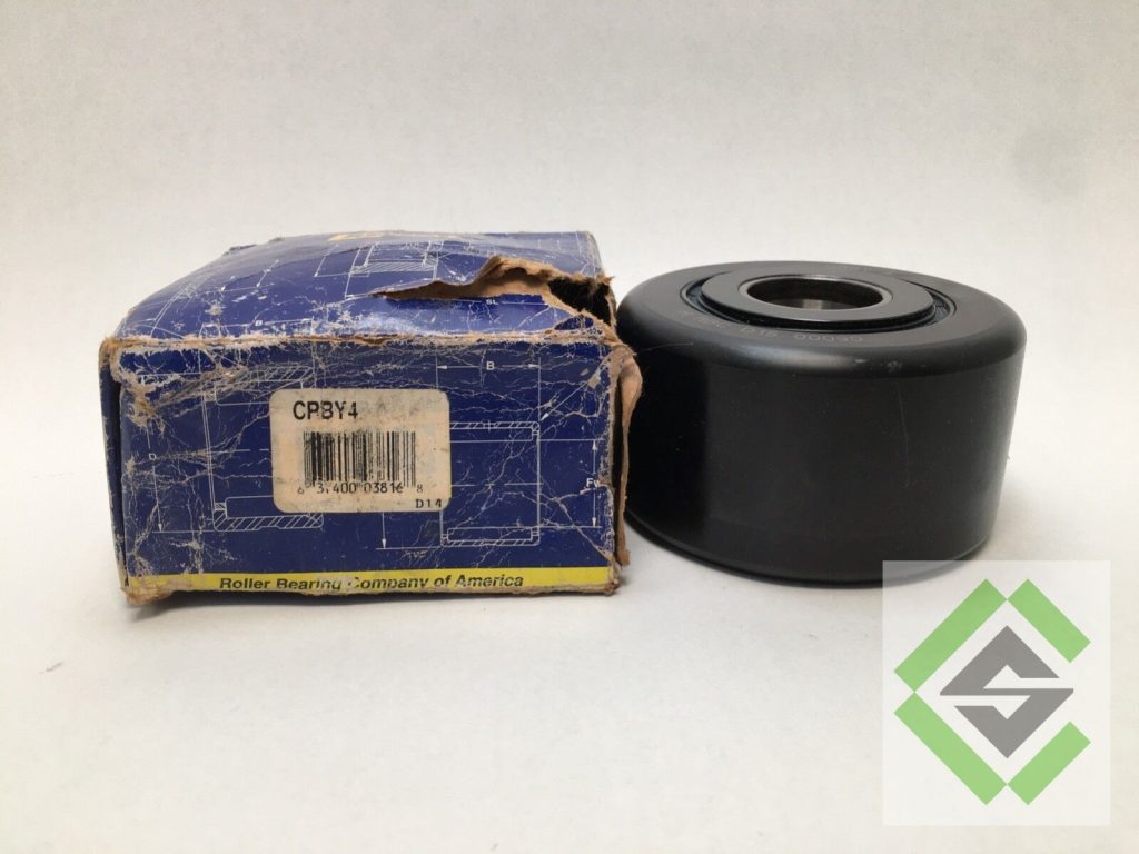 RBC CRBY4 cam follower yoke-type bearing with black crowned roller next to its worn Roller Bearing Company of America box