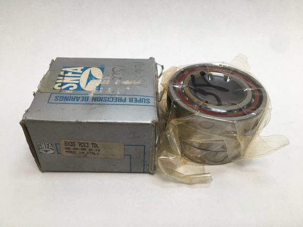 SNFA EX35-7CE3TDL angular contact ball bearing set, stacked bearings in plastic wrap beside original labeled box