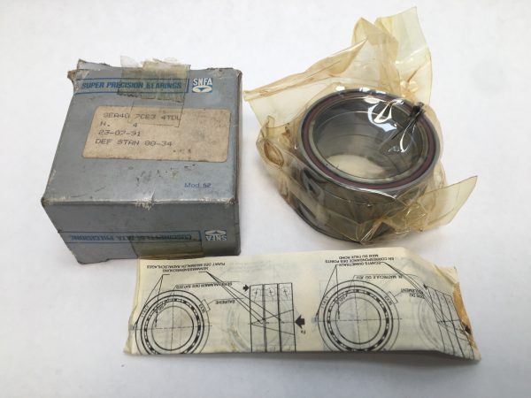 SNFA SEA40-7CE34TDL angular contact ball bearing in plastic wrap, beside its original labeled box and datasheet