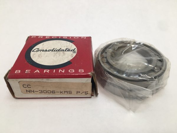 Consolidated NN-3006-KMS P/5 double row cylindrical roller bearing, shrink-wrapped, next to its branded box
