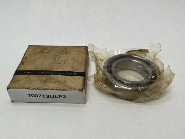 RHP 7007TSULP2 angular contact ball bearing next to its labeled box, wrapped in protective plastic