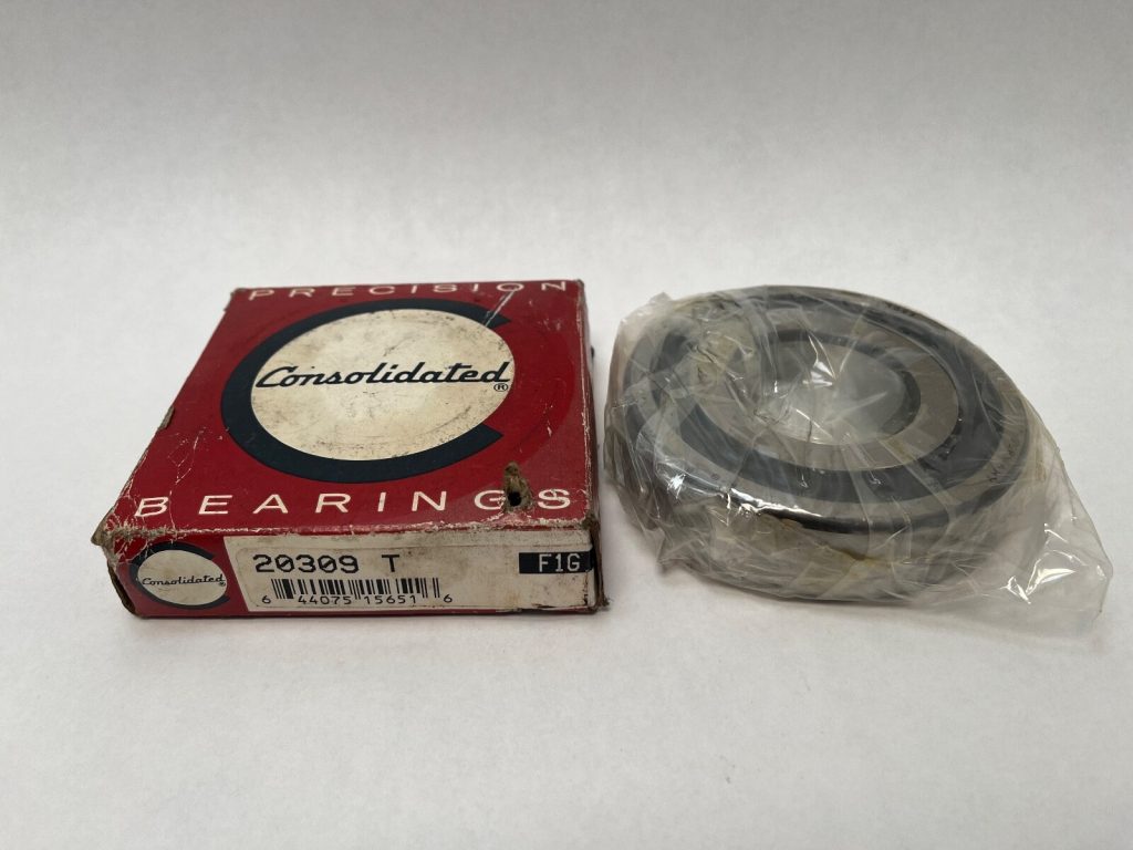 Single-row barrel roller bearing, model 20309 T, shown wrapped beside its Consolidated Bearings box
