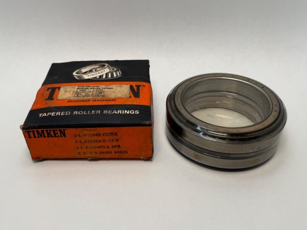 Timken L521948/L521910D double-row tapered roller bearing assembly beside its original Timken box