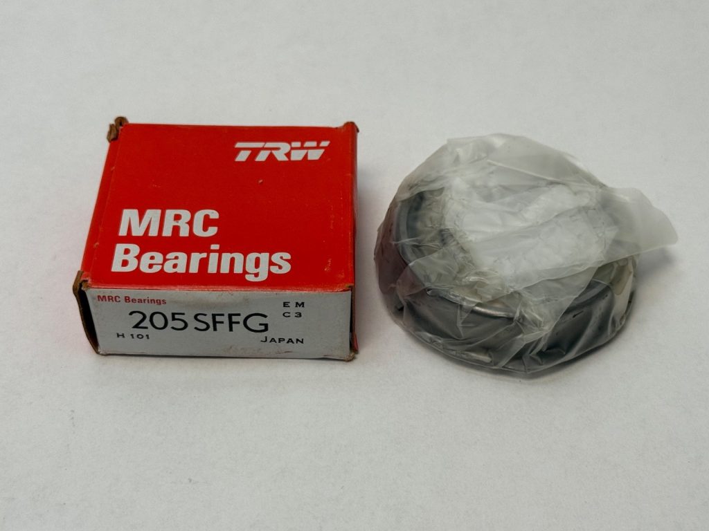TRW MRC Bearings box labeled 205SFFG next to a shrink-wrapped ball bearing