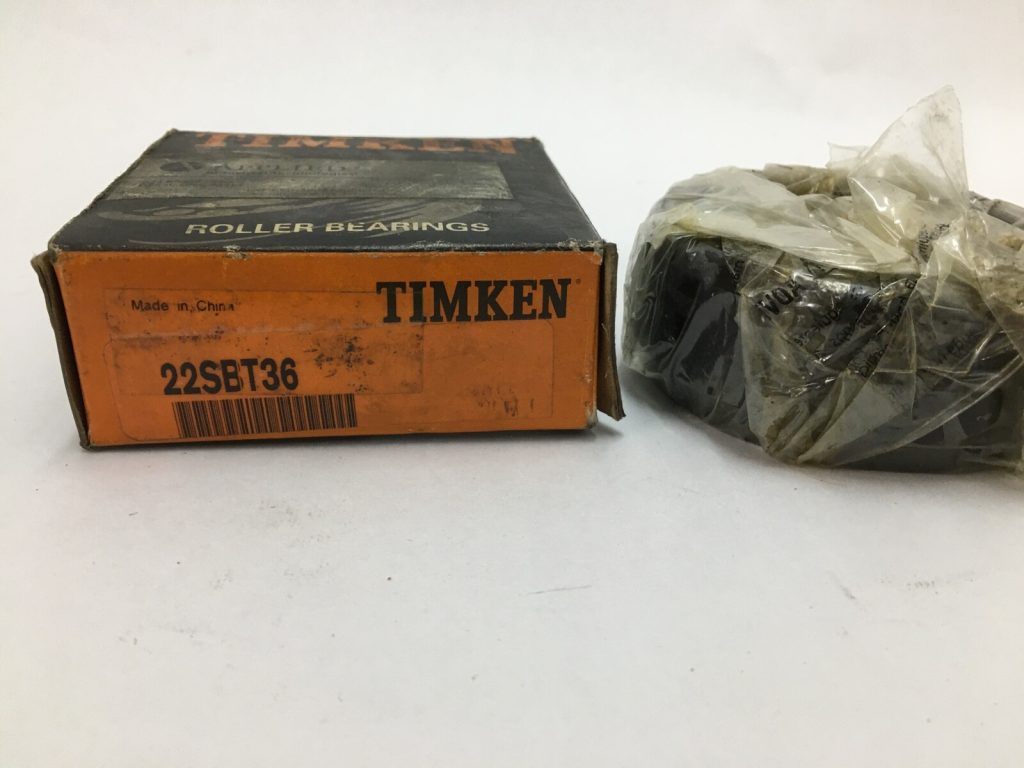 Timken 22SBT36 spherical plain bearing in original box, shown next to bearing wrapped in plastic