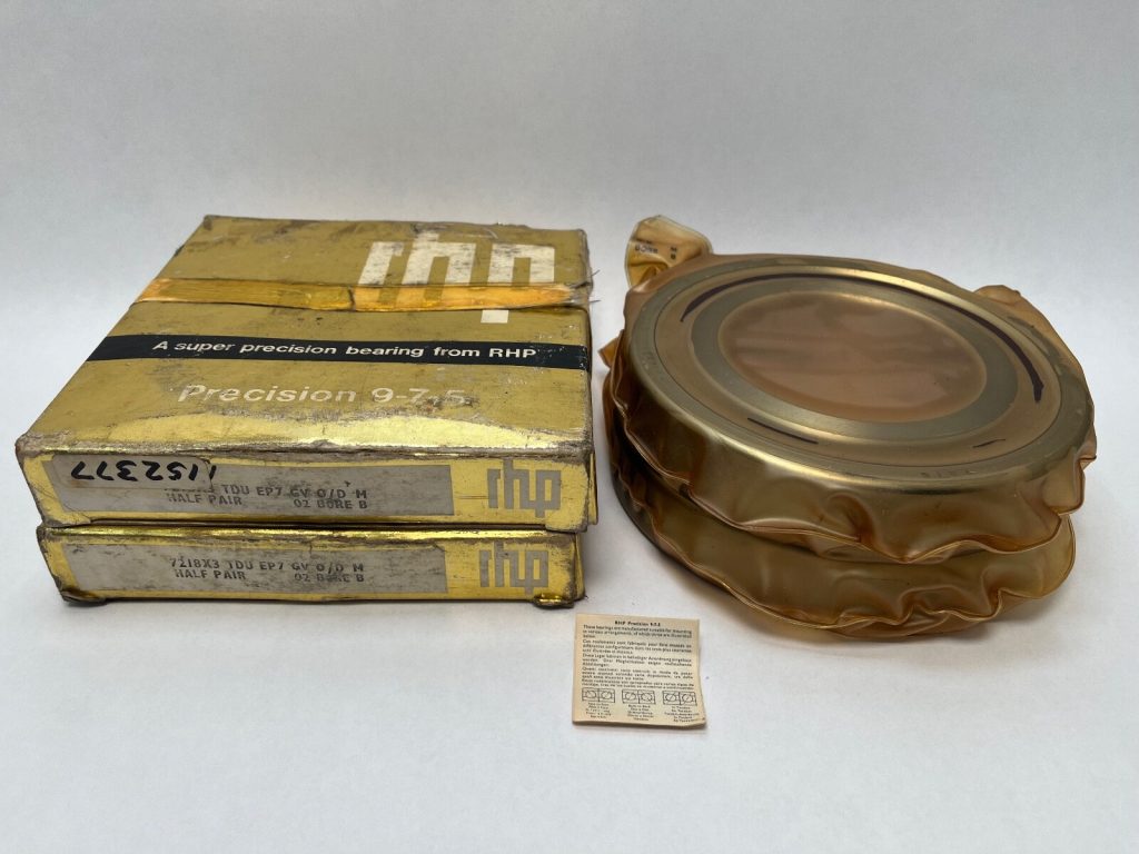 RHP 7218ETDULP4 angular contact ball bearing matched pair, wrapped bearings beside two labeled RHP boxes