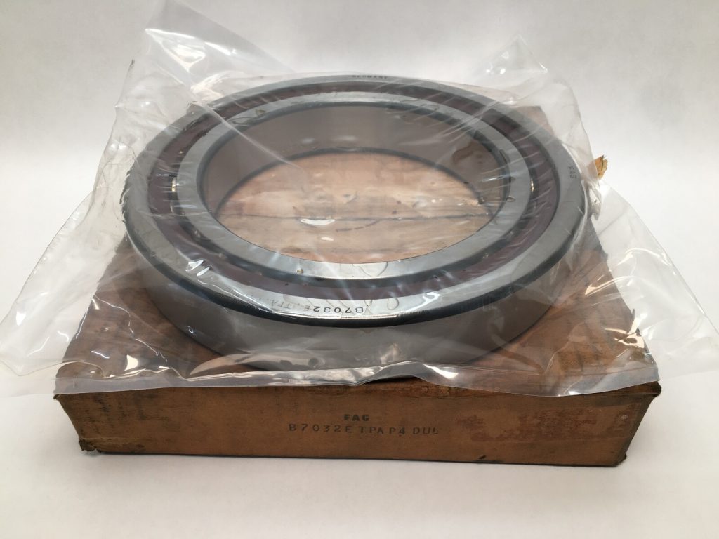FAG B7032E.TPA.P4.UL angular contact ball bearing, open design, wrapped in plastic on its original box