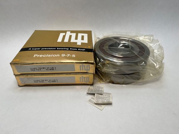 RHP 7314ATDULP4 matched pair angular contact ball bearings, shrink-wrapped, beside two gold RHP precision packaging boxes