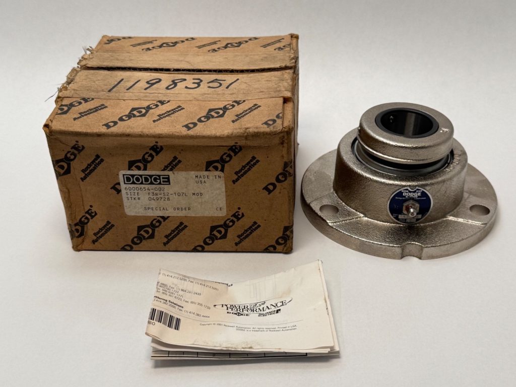 Dodge F3R-S2-107L three-bolt round flange bearing unit next to its original Dodge box and paperwork