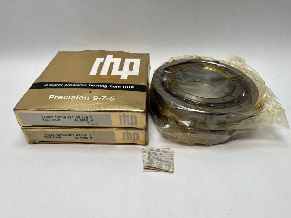 RHP 7218ETDUMP4 angular contact ball bearing duplex pair, shrink-wrapped, beside two gold RHP boxes