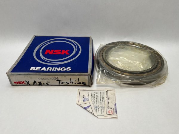 NSK 6926XMCG20P5 deep groove ball bearing in plastic wrap next to its NSK box