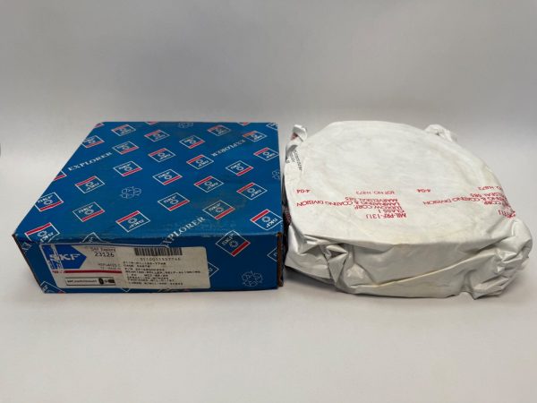 SKF 23126-CCK/W33 spherical roller bearing in blue SKF box next to wrapped bearing unit