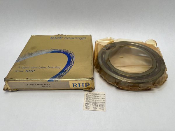RHP 7018CTDULP4 angular contact ball bearing in anti-corrosion wrap beside its gold RHP bearings box