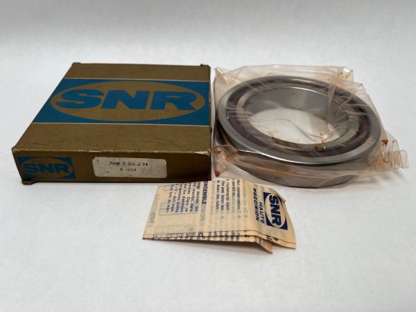 SNR 7016 CDUJ74 angular contact ball bearing beside its labeled SNR box and wrapping