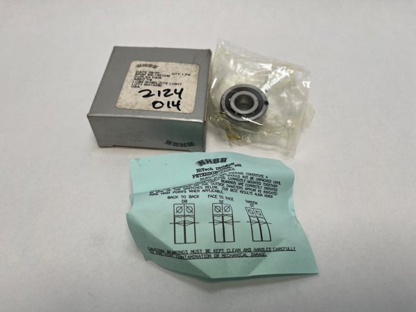 NHBB ME-1201DM angular contact ball bearing in plastic packaging beside its labeled box and instruction sheet