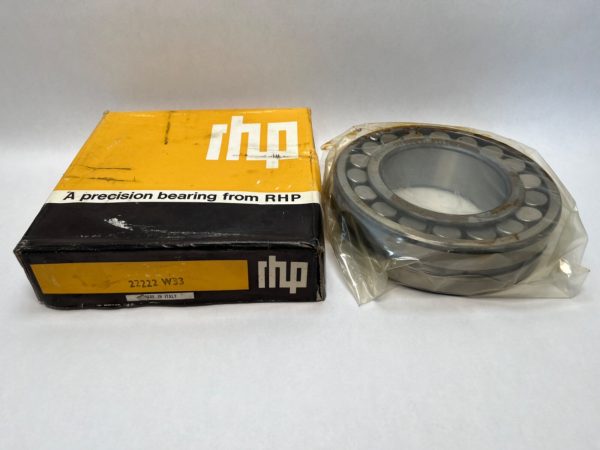 RHP 22222W33 spherical roller bearing in plastic wrap next to its original yellow and black RHP box