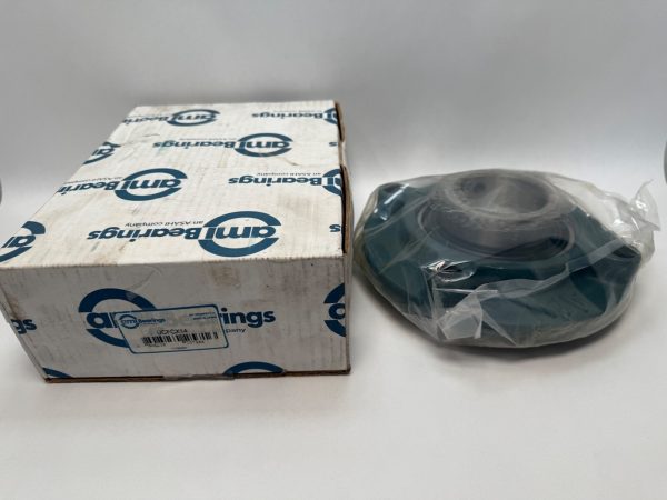 AMI piloted flange cartridge ball bearing unit in plastic wrap next to its AMI Bearings box
