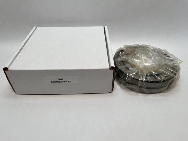 FAG 22218ESMW33 spherical roller bearing, shrink-wrapped, next to its labeled box