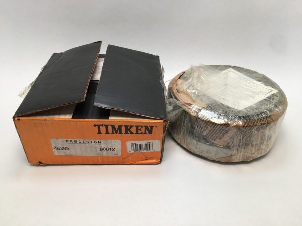 Timken 48385-90012 TDO tapered roller bearing assembly, shrink-wrapped, next to its open Timken box