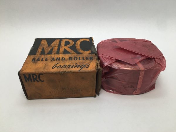 MRC 7310DS angular contact ball bearing in original box next to the bearing wrapped in red paper