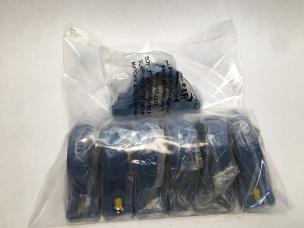 Six FSB UCPE205 pillow block units with 25 mm bore in a sealed plastic bag