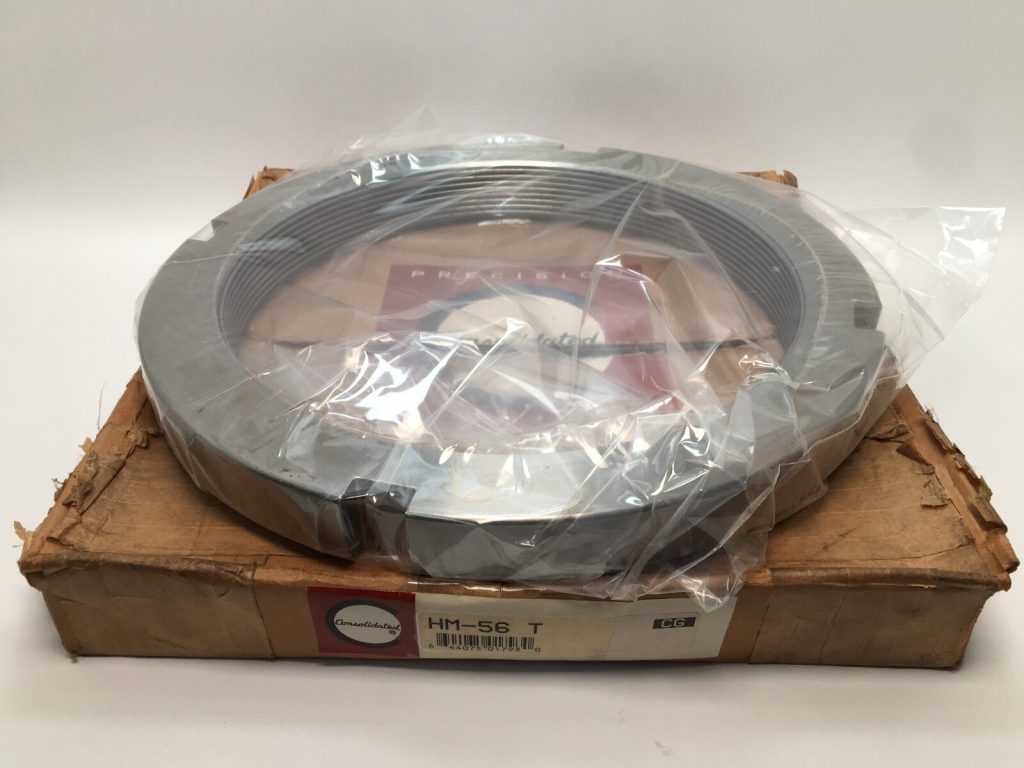 Consolidated HM-56 T bearing locknut with trapezoidal thread, wrapped in plastic atop its original cardboard box