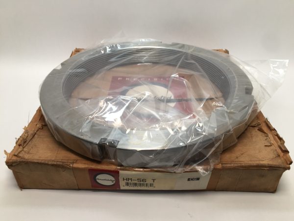 Consolidated HM-56 T bearing locknut with trapezoidal thread, wrapped in plastic atop its original cardboard box