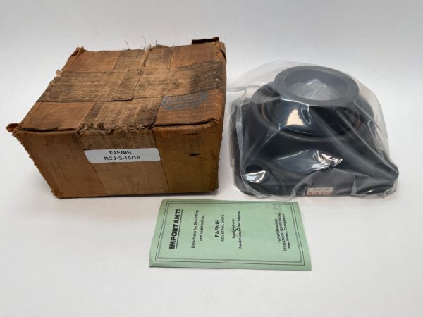 Fafnir RCJ-2-15/16 four-bolt square flange bearing unit in plastic wrap, next to its original box and instructions