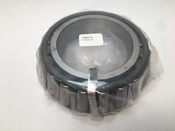 Timken 77375-3 tapered roller bearing cone wrapped in plastic, with label visible on the bore