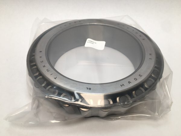 Timken 74556 tapered roller bearing cone wrapped in plastic, with Timken markings on the cage