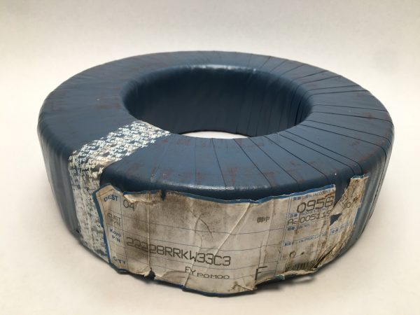 Koyo 22228RRKW33C3 spherical roller bearing wrapped in blue protective paper with original label